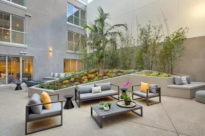 a courtyard with couches and tables in a building at Culver City 1br w pool gym easy access to 405 LAX-1136 in Los Angeles