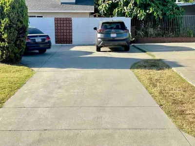 a car parked on the side of a driveway at Glendora Pool Home Retreat in Glendora