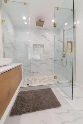 a bathroom with a shower with a glass door at Universal Studio Stellar Home with pool and jacuzzi in Los Angeles