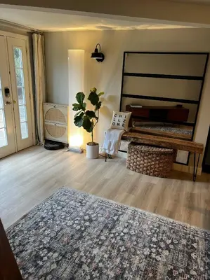 a living room with a rug and a couch at NEW Modern apt w/pool & hot tub in nature in Thousand Oaks