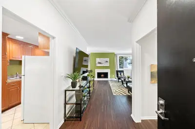 a hallway of a home with a living room at Beverly Hills Gem 1 BR Apt with Parking 218 in Los Angeles