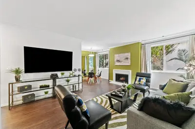 a living room with a flat screen tv and furniture at Beverly Hills Gem 1 BR Apt with Parking 218 in Los Angeles