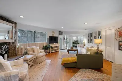 a large living room with a couch and chairs at Boho Chic Malibu Retreat Estate Salt Pool + Yoga in Malibu