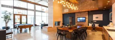 a living room with a ping pong table and a pool table at Ruby Tide - Two Floor Airy 2BR Marina Side Exclusive Amenities in Los Angeles