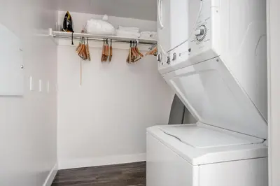 a white laundry room with a washer and dryer at North Hollywood 1br w roof terrace nr bars LAX-1130 in Los Angeles