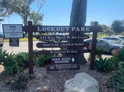 a sign for a park with different signs on it at Summer Lillie #3 in Summerland