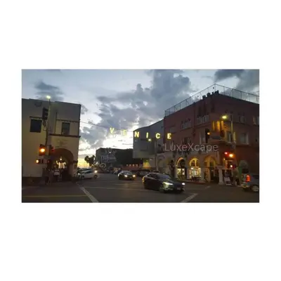 a city street with cars driving down a street at MAGICAL Xcape, POOLS-SPA, WALK 2 DISNEY, CENTRAL AC-HEAT, FULLY EQUIPPED, 2 FREE PARKING SPACES, OWNER MGMT in Anaheim