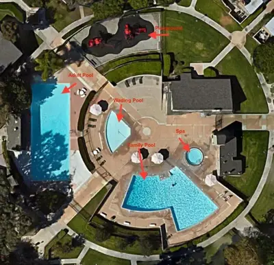 an aerial view of a mansion with a swimming pool at MAGICAL Xcape, POOLS-SPA, WALK 2 DISNEY, CENTRAL AC-HEAT, FULLY EQUIPPED, 2 FREE PARKING SPACES, OWNER MGMT in Anaheim