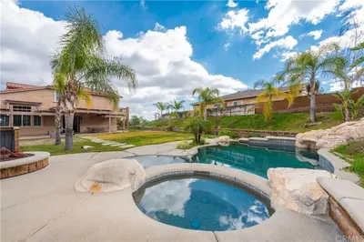 a house with a swimming pool in a yard at Private-room-Private-entrance-spectacular-city-landscape-views-from-room in Rancho Cucamonga