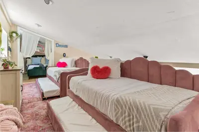 a bedroom with two beds with hearts on the pillows at The Malibu Retreat Guest House - Salt Water Pool & Jacuzzi, Nature Oasis in Calabasas