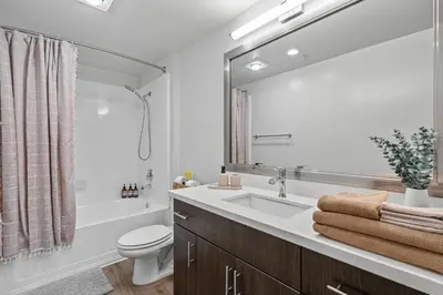 a bathroom with a sink and a toilet and a shower at Luxury 2BDR with Parking & Pool - Marina del Rey in Los Angeles