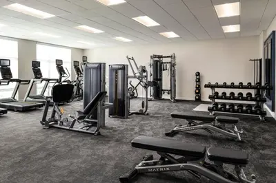 a gym with several treadmills and exercise machines at Fairfield by Marriott Inn & Suites Barstow in Barstow