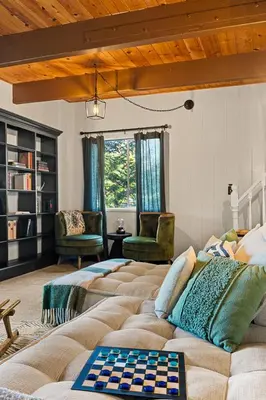 a living room with a couch and two chairs at Romantic & Family Friendly Chalet In The Woods in Lake Arrowhead