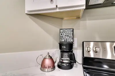 a coffee maker sitting on a counter next to a microwave at Fast WiFi and Free Parking Cozy Fontana Apartment in Fontana