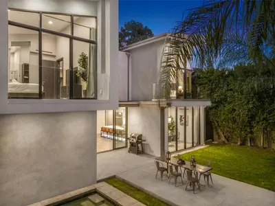 a rendering of a house with a patio and a table at Coldwater Canyon in Los Angeles