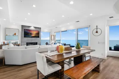 a living room with a white couch and a table at Escondido Escape in Malibu