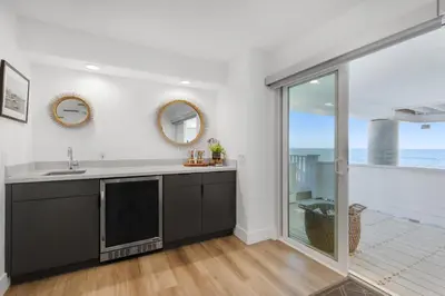 a kitchen with a sink and a view of the ocean at Escondido Escape in Malibu