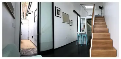 a hallway of a house with a staircase at Dogtown Loft in Los Angeles