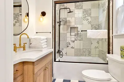 a bathroom with a shower and a sink and a toilet at Pine Meadow Village Castle~ Incredible Chalet Home in Big Bear Lake