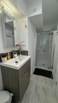 a bathroom with a sink and a shower at AB&B suite in Chino Hills