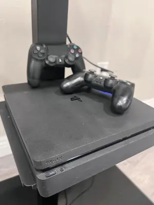 a video game controller sitting on top of a table at Cozy Room with Private bathroom & Entrance in Carson