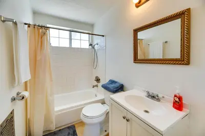a bathroom with a sink and a toilet and a mirror at 3 Mi to Universal Studios North Hollywood Home in North Hollywood