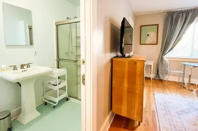 a bathroom with a sink and a mirror at Peaceful 1BR Suite, Yurt and Barn in Cypress Park in Glendale