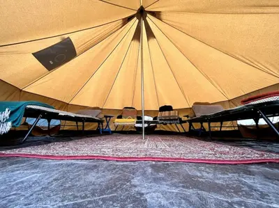 a room with a large tent with beds in it at Peaceful 1BR Suite, Yurt and Barn in Cypress Park in Glendale
