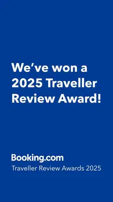 a blue sign that says weve won a traveler review award at Disneyland Retreat-Pool Spa Game in Anaheim
