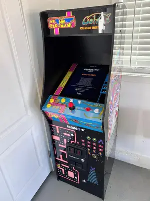 a box of a video game is sitting next to a door at Disneyland Retreat-Pool Spa Game in Anaheim