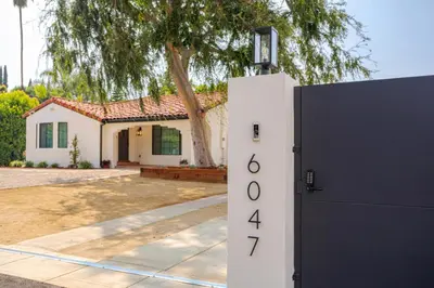 a house with a foreclosure sign in front of it at Elegant Guest unit Universal sleeps 6 hot tub in Los Angeles