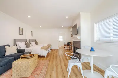 a living room with a couch and a table at Elegant Guest unit Universal sleeps 6 hot tub in Los Angeles