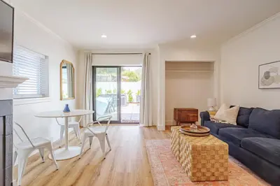 a living room with a couch and a table at Elegant Guest unit Universal sleeps 6 hot tub in Los Angeles