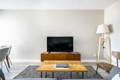 a living room with a coffee table and a flat screen tv at Redondo Beach 1BR w Pool Gym nr Beach LAX-398 in Redondo Beach