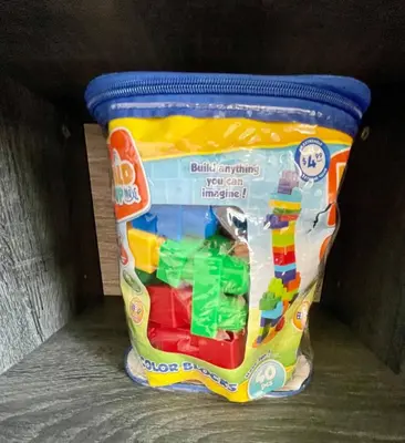 a toy in a container sitting on a shelf at Stylist Home In Convenient Location! in Temple City