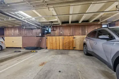 a parking garage with a car parked in it at On the Boardwalk in Long Beach