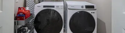 two washing machines sitting next to each other in a room at Amazing Value with High Comfort, 14 Guests for 4BR by Disneyland, Beaches, Rodeo 39 & More in Midway City