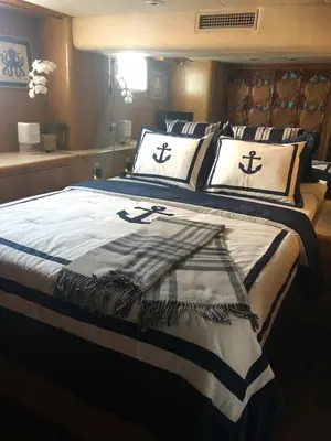 a large bed with two pillows on it at Luxury Afloat Yacht Paradise 3 bedrooms 3bath 5 beds with full Marina view in Los Angeles