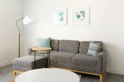 a living room with a couch and a table at TownePlace Suites by Marriott Monrovia in Monrovia