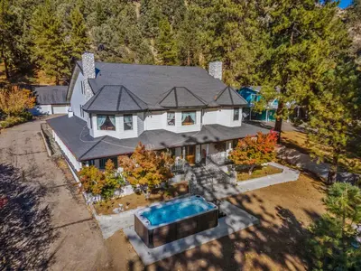 an aerial view of a house with a swimming pool at Mountain High Luxury Castle &Spa in Wrightwood