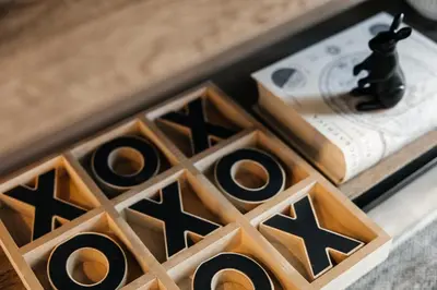 a close up of a wood block with a dice at Elegant Apartment in the Heart of Hollywood in Los Angeles