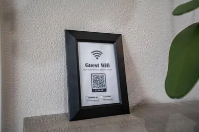 a black box with a guest wifi sign on a wall at Incredible Value for 12 guests, New 3BR Home by Disneyland, Knott's, Beach in Midway City