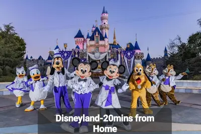 a group of mascots standing in front of a castle at Incredible Value for 12 guests, New 3BR Home by Disneyland, Knott's, Beach in Midway City