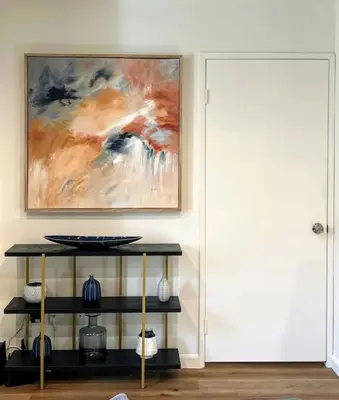 a painting on the wall above a table in a room at Trendy 2BR Near Hollywood Hotspots - BR9 in Los Angeles