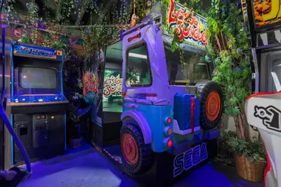 a toy truck parked next to a video game at Safari Adventure by OC Adventure Homes in Garden Grove