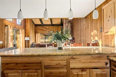 a kitchen with a large marble counter top at NEW Summit Lookout in Big Bear Lake