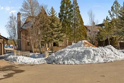a pile of snow on the side of a street at HoneyBear Lodge Lakefront in Big Bear Lake