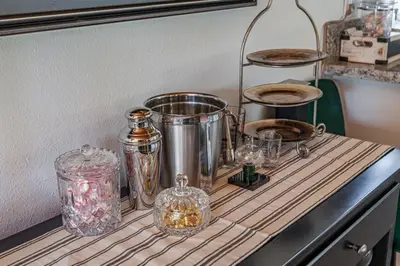 a counter top with a bunch of items on it at Honeybee by the Bay in Big Bear Lake in Big Bear Lake
