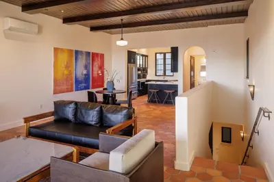 a living room with a couch and a table at Hotel San Buena in Ventura