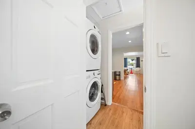 a white laundry room with a washer and dryer at Spacious 3Bdr Home close to Manhattan Beach in Lawndale